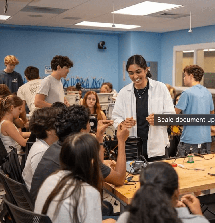 Volunteers and students building adaptive toys